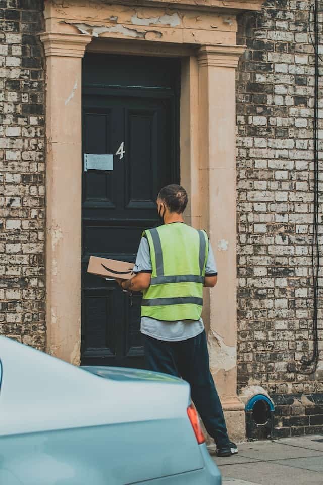 delivery man in front of door